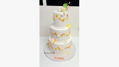 Gâteau de mariage princesse Ivania theme jaune orange